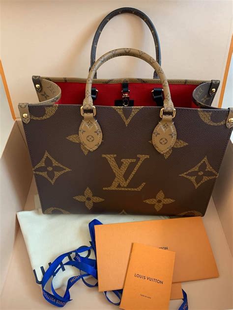 Louis Vuitton Monogram Reverse Cite E